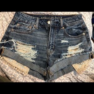 Distressed denim shorts